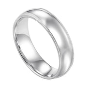 Classic styling is infused into this low-dome, Comfort Fit wedding band design featuring a high polished finish with delicate milgrain detailing