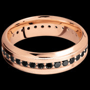 7 mm wide/High Bevel Milgrain/14K Rose Gold band with an Eternity arrangement of .03 carat Round Black Diamond stones in a Bead Channel setting.