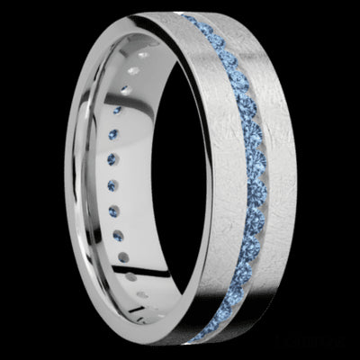 7 mm wide/Flat/14K White Gold band with an Eternity arrangement of .03 carat Round Denim Sapphire stones in a Channel setting.