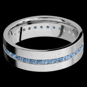 7 mm wide/Flat/14K White Gold band with an Eternity arrangement of .03 carat Round Denim Sapphire stones in a Channel setting.