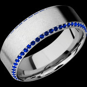 8 mm wide/High Bevel/14K White Gold band with a Bevel Eternity arrangement of .01 carat Round Sapphire stones in a Bead setting.