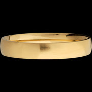 4 mm wide Domed 14K Yellow Gold band.