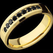 6 mm wide/Beveled/14K Yellow Gold band with an  arrangement of 9, .05 carat Round Black Diamond stones in a Bead Channel setting.