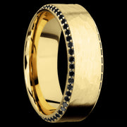 8 mm wide/High Bevel/14K Yellow Gold band with a Bevel Eternity arrangement of .01 carat Round Black Diamond stones in a Bead setting.