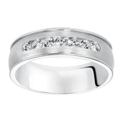22-8105W-G.00 - Goldman - Distinct yet timeless, this low-domed, Comfort Fit, 7 stone diamond wedding band features satin finish with round edges