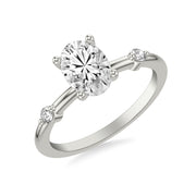 Contemporary Engagement Ring with Single Diamond Station Accented Band