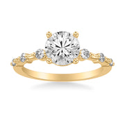 Contemporary Engagement Ring with Single Diamond Station Accented Band