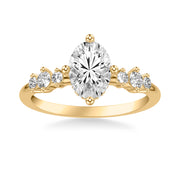 Contemporary Engagement Ring with East West Prong Setting and Single Diamond Station Accented Band