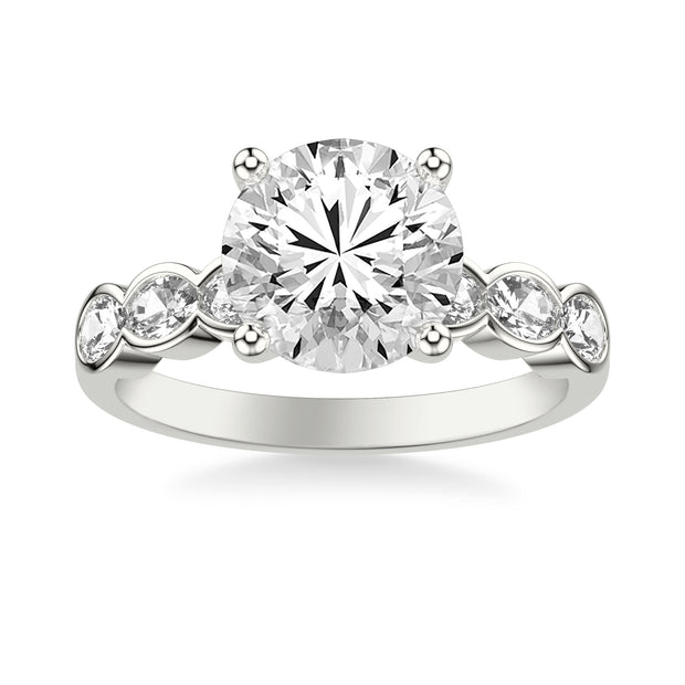 Contemporary Engagement Ring with East-West Bezel Set Oval Diamond Scalloped Shank