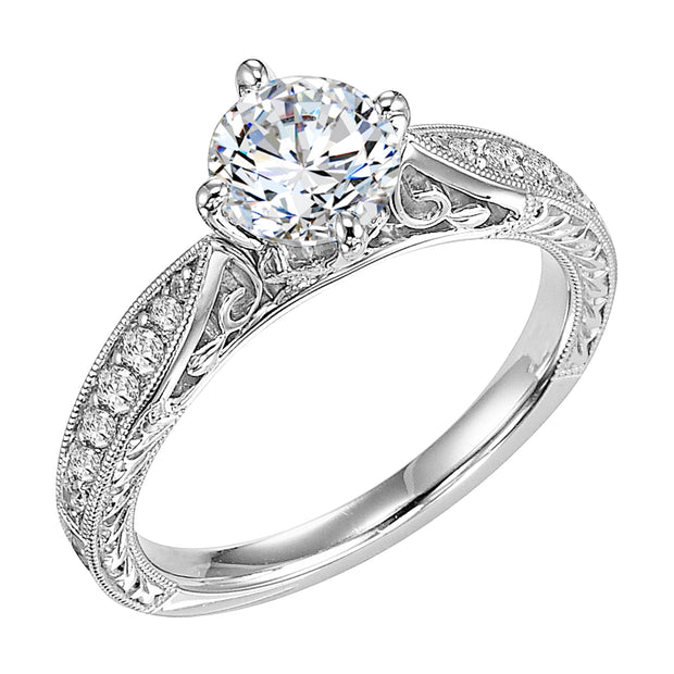 31-553ERW-E.00 - Goldman - Masterfully crafted, this engagement ring dazzles with its round center stone and prong set diamond band with delicate milgrain and beautiful engraving