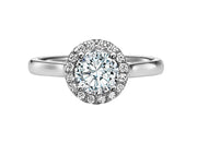 A magnificent diamond prong set halo gracefully accentuates the center diamond whilst paired with a high polished band for a timeless, spectacular design