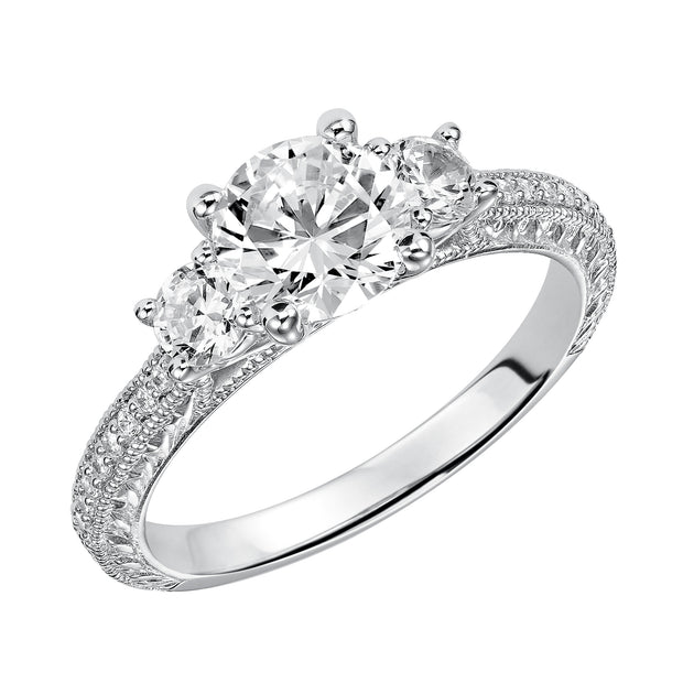 31-745ERW-E.00 - Goldman - This eye-catching 3-stone engagement sparkles with its diamond prong set band with engraving and milgrain details