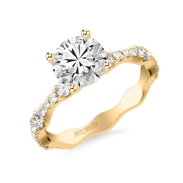 Classic Engagement Ring with Graduated Diamond sizes and Scalloping Shank