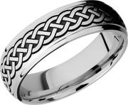 Titanium 7mm domed band with grooved edges and a laser-carved celtic pattern