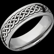 7 mm wide/Domed Stepped Down Edges/Cobalt Chrome band with a laser carved Celtic 9 pattern.