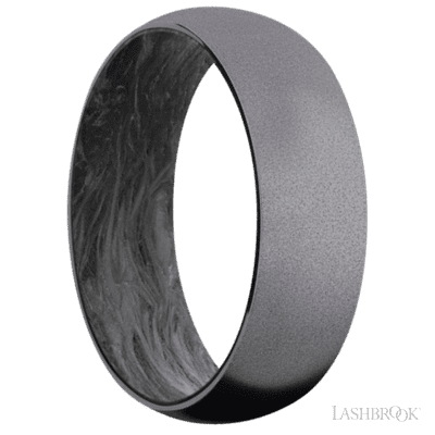 7 mm wide Domed Tantalum band featuring a Forged Carbon Fiber sleeve.