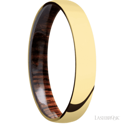 4 mm wide Domed 14K Yellow Gold band featuring a Cocobolo sleeve.