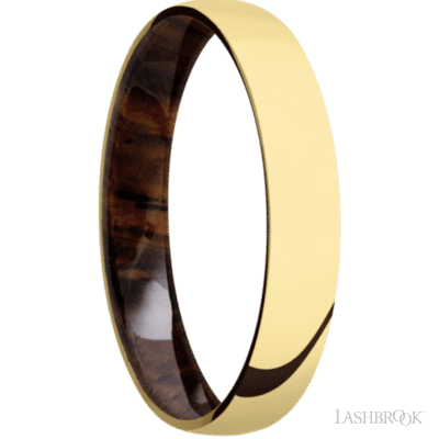 4 mm wide Domed 14K Yellow Gold band featuring a Cocobolo sleeve.