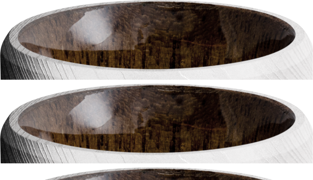 Damascus steel 8mm beveled band with a sleeve of Walnut hardwood