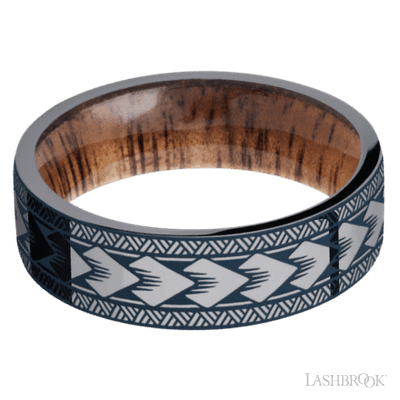 7 mm wide/Flat/Tantalum band with a laser carved Maori pattern also featuring a Koa sleeve.