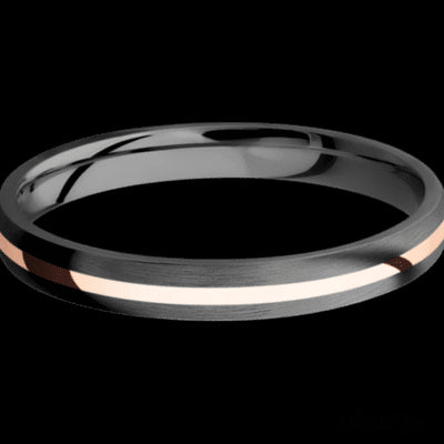 3 mm wide/Domed/Zirconium band with one 1 mm Centered inlay of 14K Rose Gold.