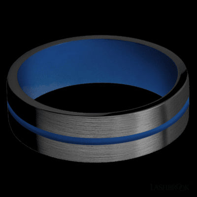 7 mm wide/Flat/Zirconium band with one 1 mm Centered inlay of Royal Blue also featuring a Royal Blue sleeve.