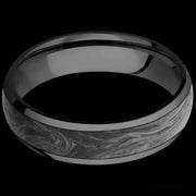 6 mm wide/Domed/Zirconium band with one 4 mm Centered inlay of Forged Carbon Fiber.