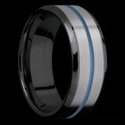 8 mm wide/Beveled/Zirconium band featuring inlays of Tantalum and Polar Blue.